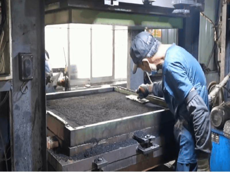 Low density rubber flooring under heavy weight load